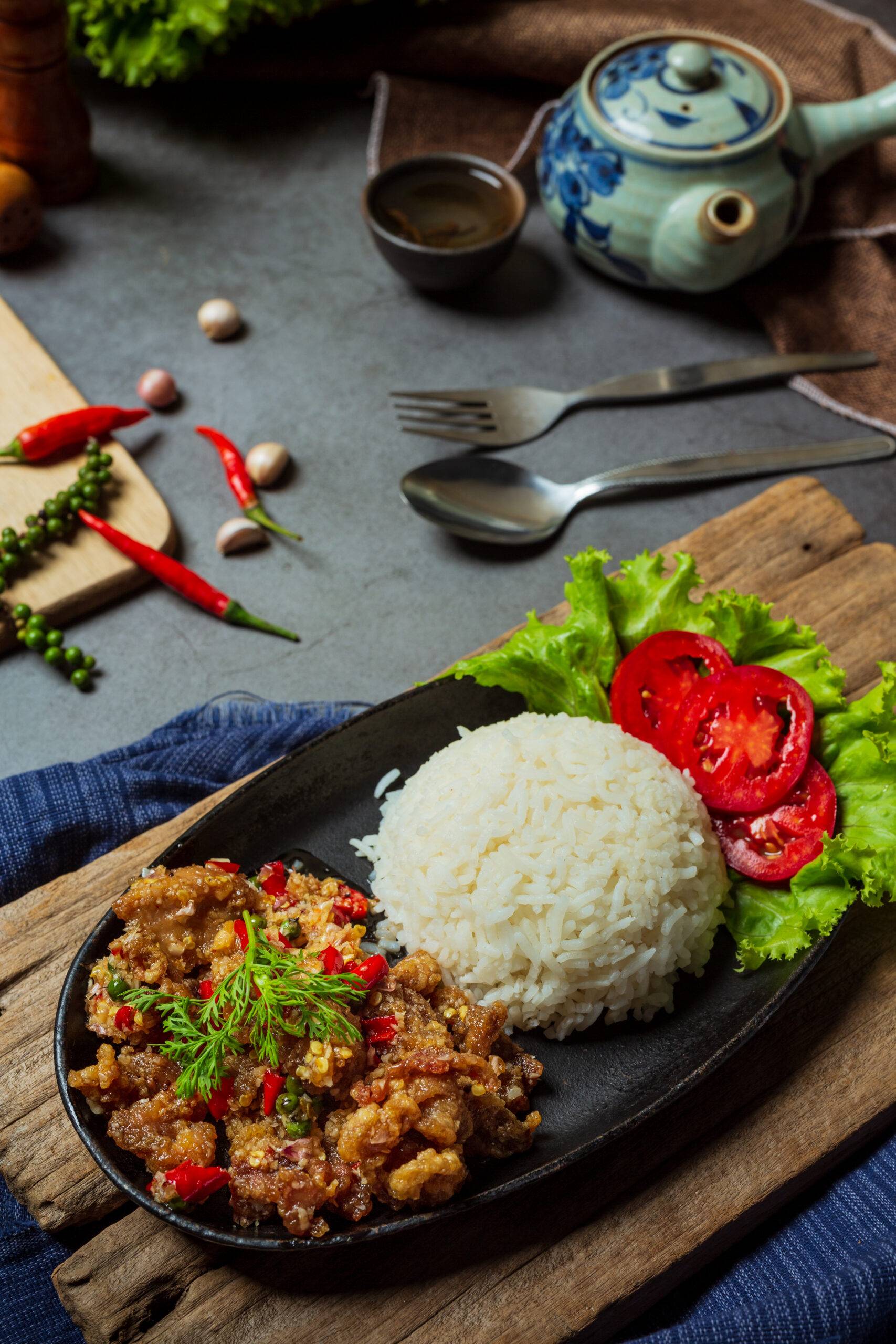 Stir fried pork, salt and chillies, decorated with Thai food ing